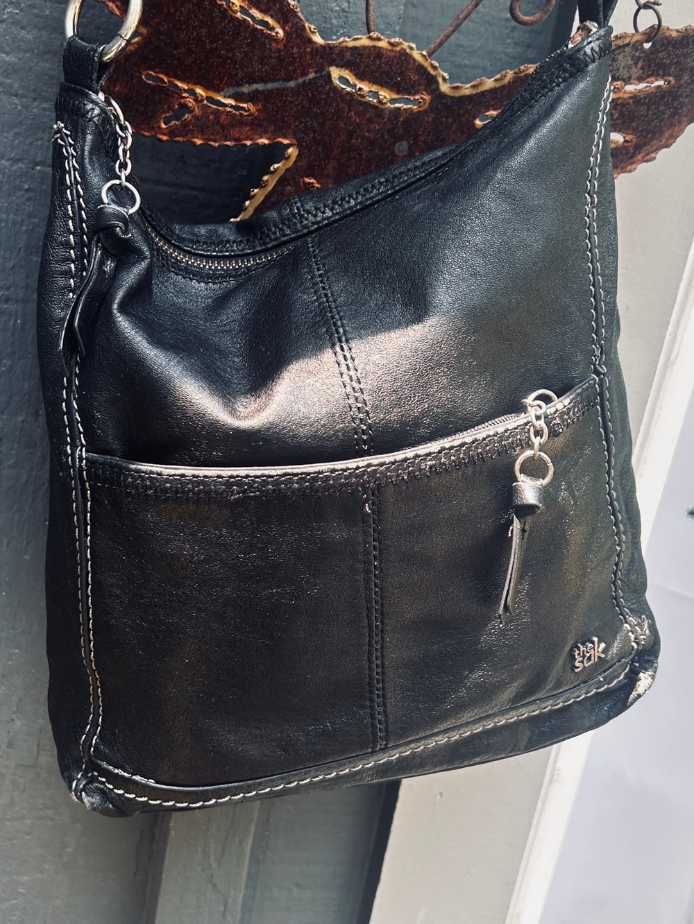 The Sak Lucia Black Leather Crossbody with Front Slip Pocket